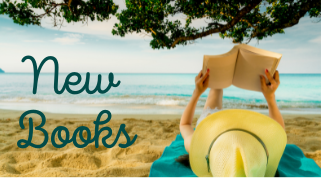 Lady laying on beach with a straw hat and book in her hands over her head, blue ocean waves in the background